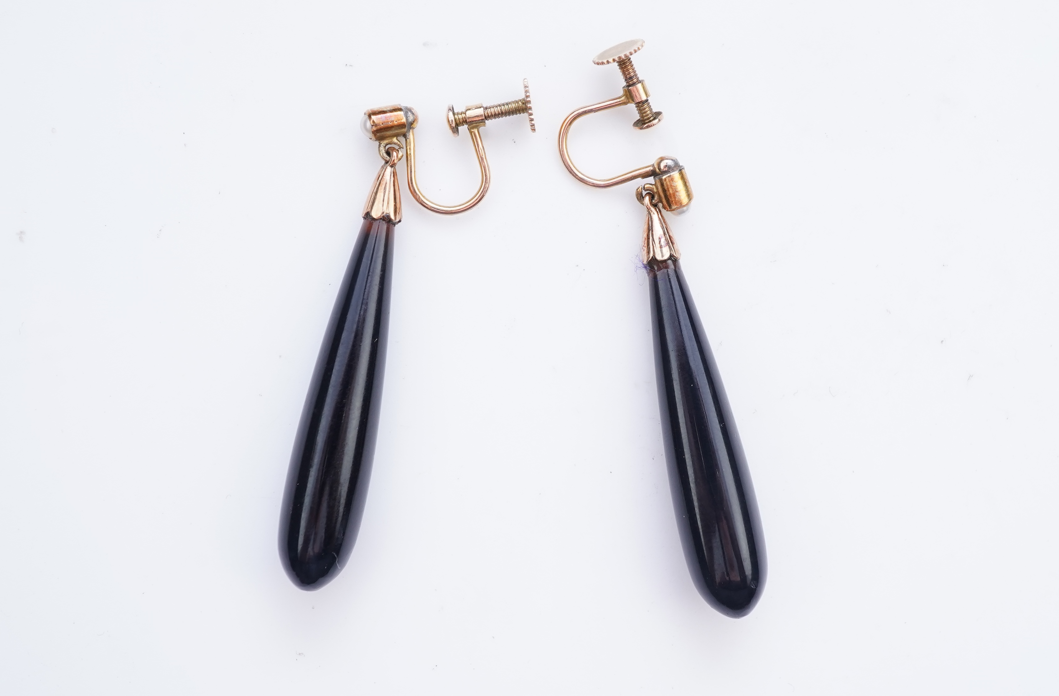 A pair of onyx and split pearl earrings, circa 1900